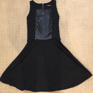 Black dress With faux leather design on top